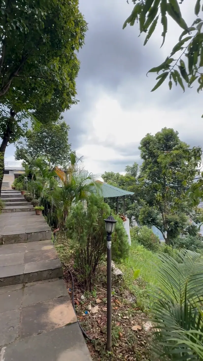 The stone path that climbs through the garden to The Lookout